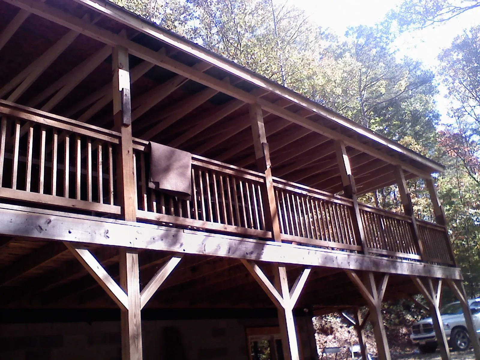 Timber framing under a new elevated porch and deck — Roof Leak Repair in Fort Klamath by Roofing Brothers